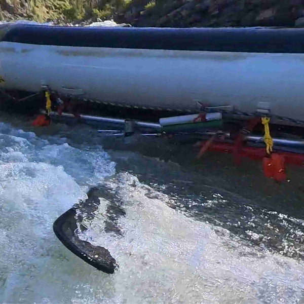 Friends will soon use the flip lines to right this boat!