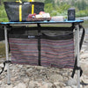 Under-table storage system for rafting camp kitchen